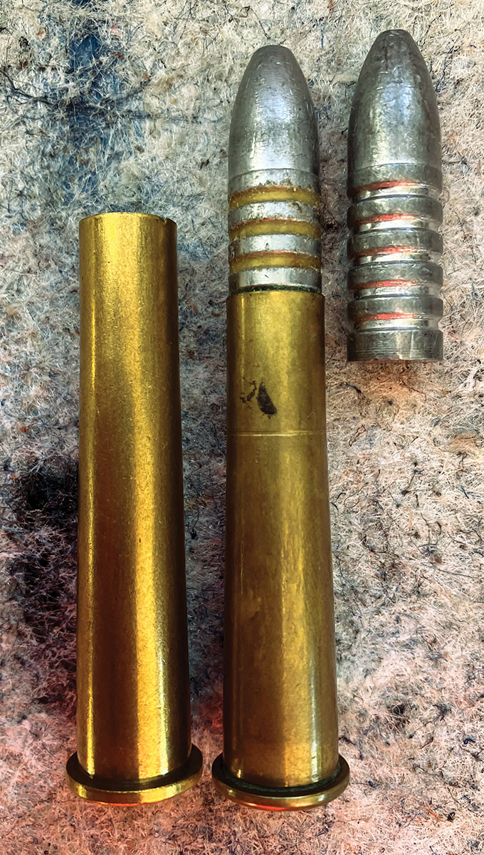 The original 40-65 loaded cartridge with the Dave Farmer bullet, as specified by Wolfgang Droege, and a 40-82 Crossno case for comparison.